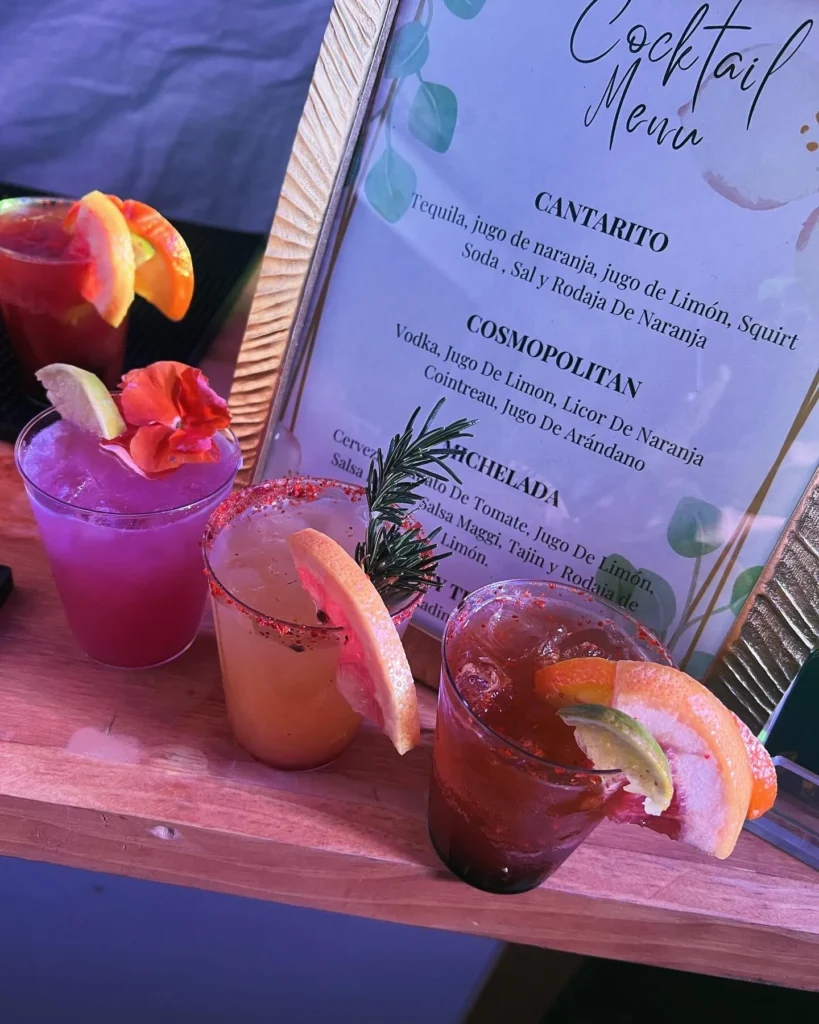 Professional bartender mixing craft cocktails at a corporate event in San Jose
